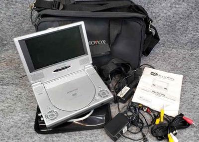 Audiovox portable dvd cd mp3 player with accessories