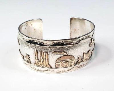 Sterling silver navajo storytelling cuff bracelet
