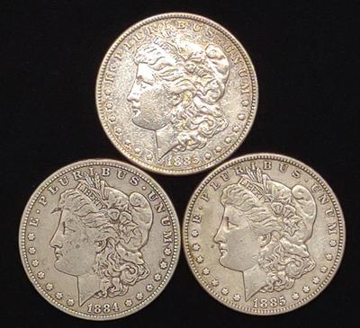 Sale Photo Thumbnail #317: (3) Morgan Dollar US Coins (1884 & 1885)