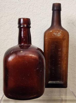 2 vintage medicine bottles