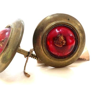 Sale Photo Thumbnail #21: Pr. antique curtain tie backs w/ horse in center of ruby glass., probably rare.