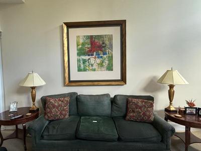 Green Lester upholstered sofa and pillows - 90”l x 36”d x 32”h