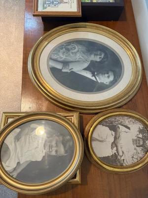 Oval Gold framed antique photos
