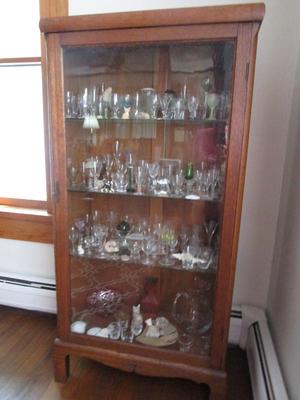 Antique curio cabinet (3 glass shelves) - Oak cabinet with legs and a glass door with a key. Dimensions are 67.5" H, 27.25" W,...