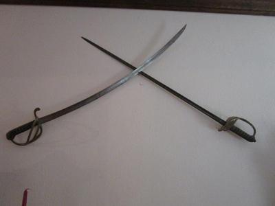 Sale Photo Thumbnail #43: Victorian cavalry sword (on right), as used by British troops in India, serving with the Indian Army. Some tarnish (typical for age).  Certified as antique and over 135 years old.

