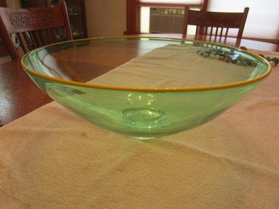 Sale Photo Thumbnail #76: Green glass bowl with yellow trim. Original art.
