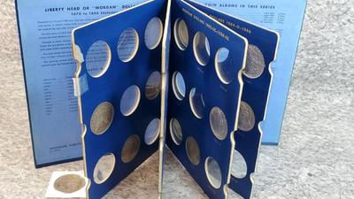 17) morgan silver dollars 1878 1886 collector's book