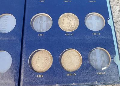 3) morgan silver dollars 1897 1921 collector's book