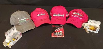 THREE SIGNED EDELBROCK HATS, A SIGNED JOHN FORCE RACING HAT, AND THREE TOY MODEL RACING CARS