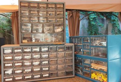 STORAGE DRAWERS WITH SCREWS, NUTS, AND THE LIKE 