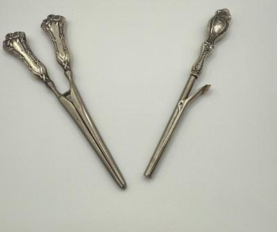 Vintage Sterling Silver-Handled Curling Irons
Lot #: 29