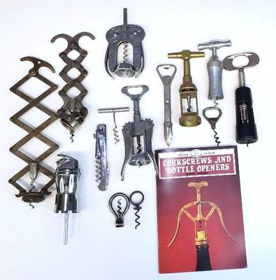 Vintage collector s corkscrews, bottle openers and book