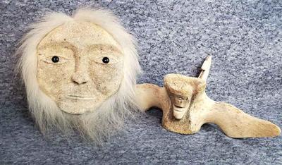 Alaskan hand carved whale bone sculpture wall art