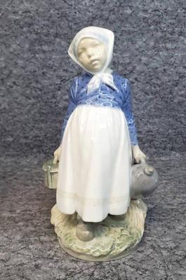 Royal copenhagen peasant girl with lunch figurine