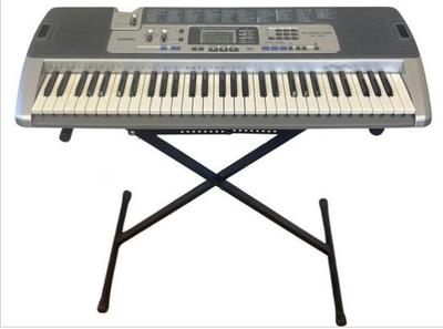 Casio LK-100 61 Key Electronic Keyboard With Tutorial Lighting System