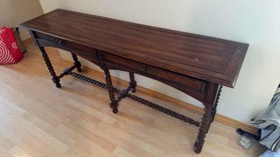Long wooden table with drawers
