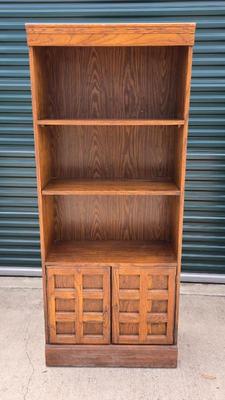 Wooden bookshelf with hidden storage 2