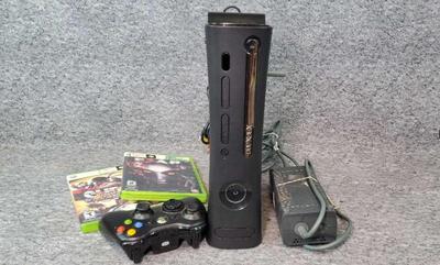 Xbox 360 with controller and 2 games
