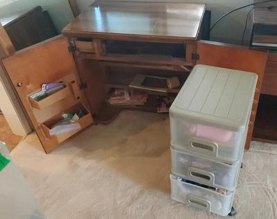 CRAFTING TABLE WITH FARBIC, SUPPLIES, AND STORAGE