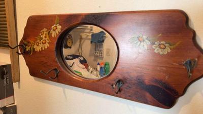 Mirror with hooks