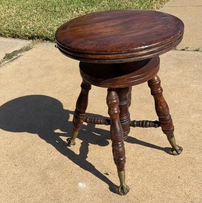Late victorian era adjustable piano stool with claw and ball feet