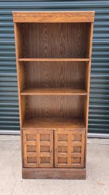 Wooden bookshelf with hidden storage 2