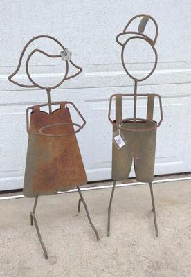 Sale Photo Thumbnail #660: Two Metal Outdoor People Planter Holders