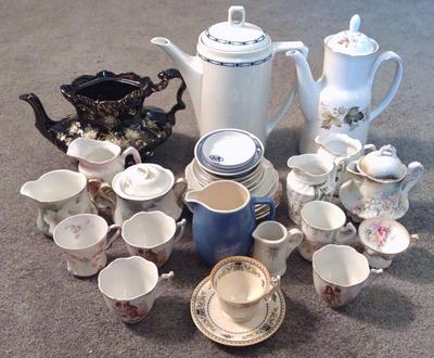 Sale Photo Thumbnail #538: Porcelain Teapots & Teacups