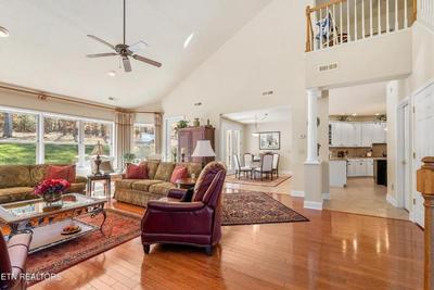 Sale Photo Thumbnail #4: Nice rugs and a beautiful leather recliner with nail head trim.