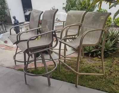 LOT OF FOUR PATIO STOOLS