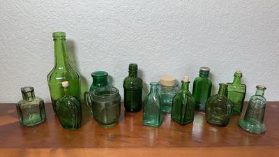 Emerald Glass Small Bottles Collection