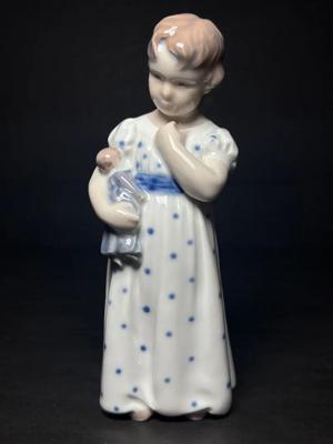 Royal Copenhagen Porcelain Figurine “Girl with Doll" or "Pige Med Dukke,"
