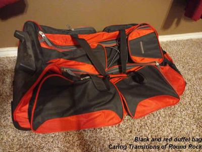 Black and red duffel bag