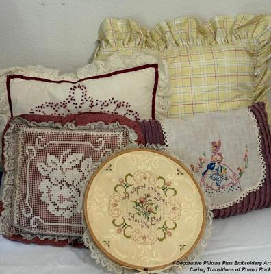 4 decorative pillows plus embroidery art
