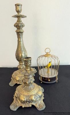 2 brass candle holders plus musical bird in a cage