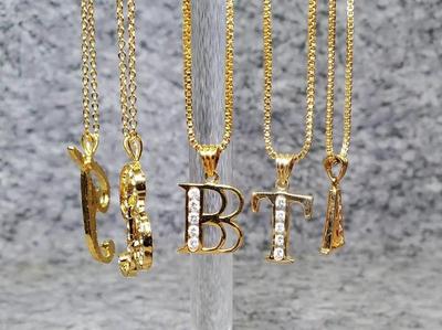 Necklaces initial pendants gold tone, rhinestones