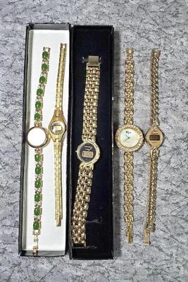 Ladies watches gold tone bands, gems, rhinestones