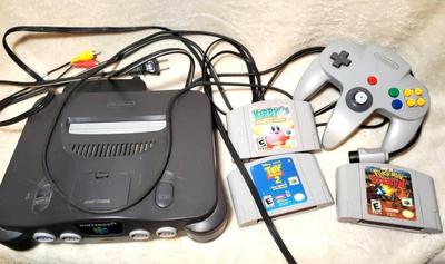 Nintendo 64 console controllers and 3 games