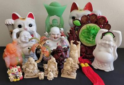 COLLECTION OF LAUGHING BUDDHAS AND BECKONING CATS