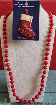1 red bead necklace plus new red stocking ornament 1