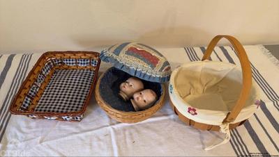 Three wicker baskets and two doll heads 1