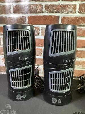 Two lasko twist top table fans 1