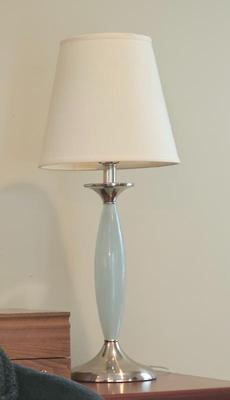 One of a pair of celadon green lamps
