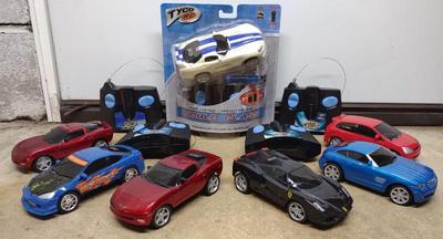 Sale Photo Thumbnail #519: 7 Tyco World Class RC Car Toys w/ 4 Controllers