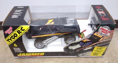 Sale Photo Thumbnail #34: Tyco Pre-Production RC Jammer Toy Truck in Box