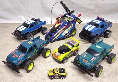 Sale Photo Thumbnail #499: 7 Tyco RC Toy Cars & Trucks