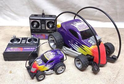 Sale Photo Thumbnail #509: 2 Tyco Hot Rocker RC Toy Cars w/ Controllers