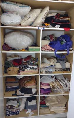 Sale Photo Thumbnail #567: Cabinet of Sewing & Quilting Fabrics & Stuffing