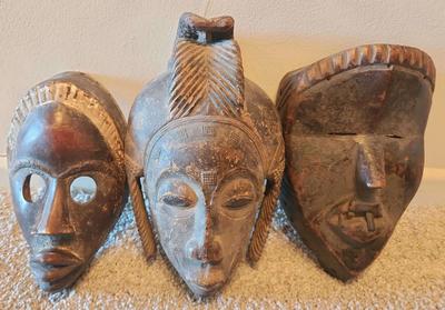 THREE IVORY COAST WOODEN MASKS