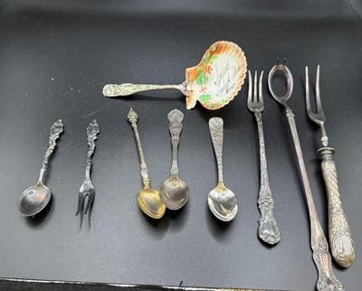 Lot Of (9) Vintage Silverplate Pieces- Pickle Forks, Olive Spoon, (4) Demitasse & Seashell Souvenir
Lot #: 91